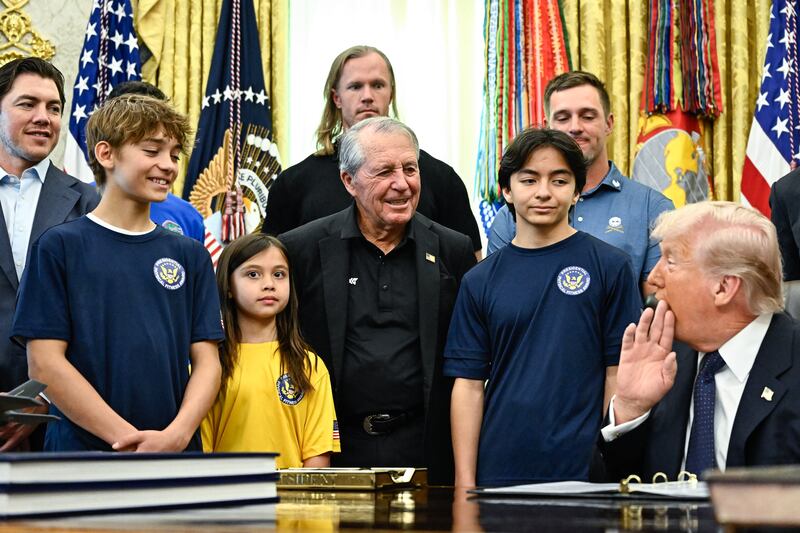 President Donald Trump speaks before signing a proclamation to revive the Presidential Fitness Test Award, a competitive school-based fitness program, in the Oval Office of the White House in Washington, DC on May 5, 2026.