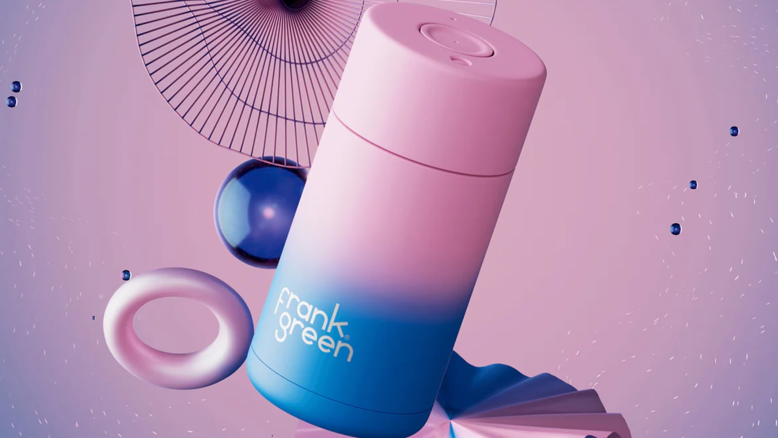 Pink and blue gradient frank green water bottle on a pink background.