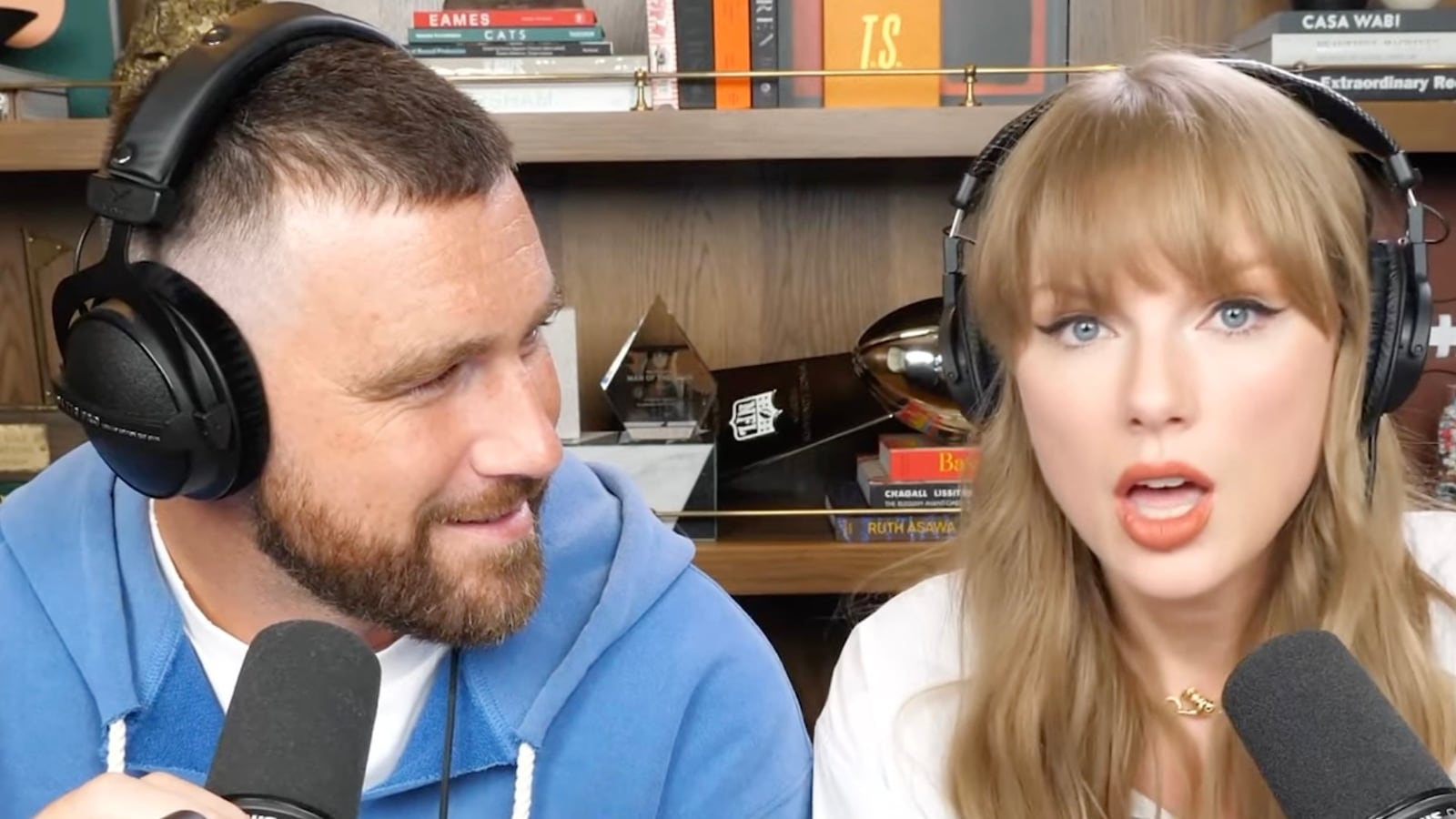Taylor Swift with Travis Kelce on New Heights podcast.