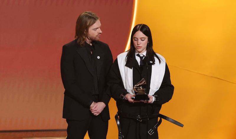 U.S. musician Finneas (L) and U.S. singer-songwriter Billie Eilish accept the award for Song of the Year for "Wildflower" on stage during the 68th Annual Grammy Awards at the Crypto.com Arena in Los Angeles on February 1, 2026.