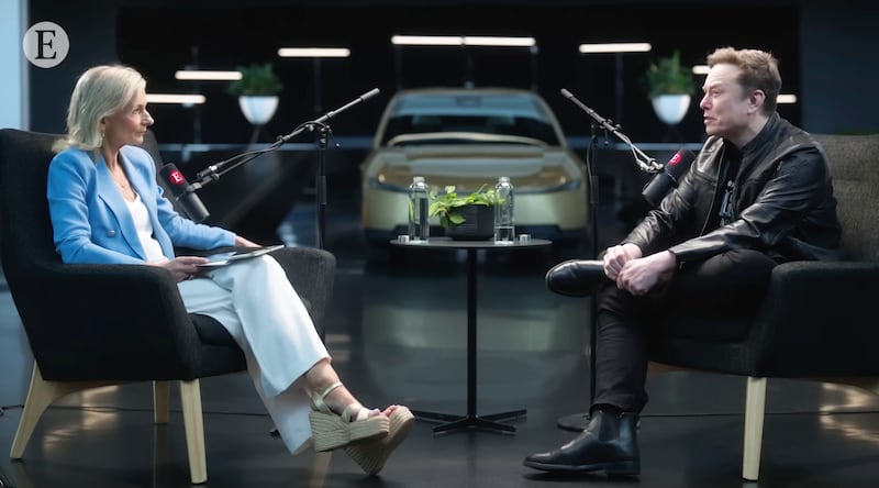 Elon Musk being interviewed by Zanny Minton Beddoes.