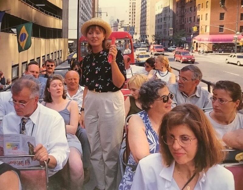 Christina Stanton leads a tour group in New York City in 1996.