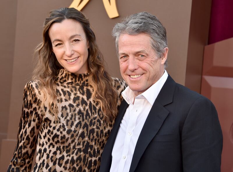 LOS ANGELES, CALIFORNIA - DECEMBER 10: Anna Elisabet Eberstein and Hugh Grant attend the Los Angeles Premiere Of Warner Bros. "Wonka" at Regency Village Theatre on December 10, 2023 in Los Angeles, California. (Photo by Gregg DeGuire/WireImage)