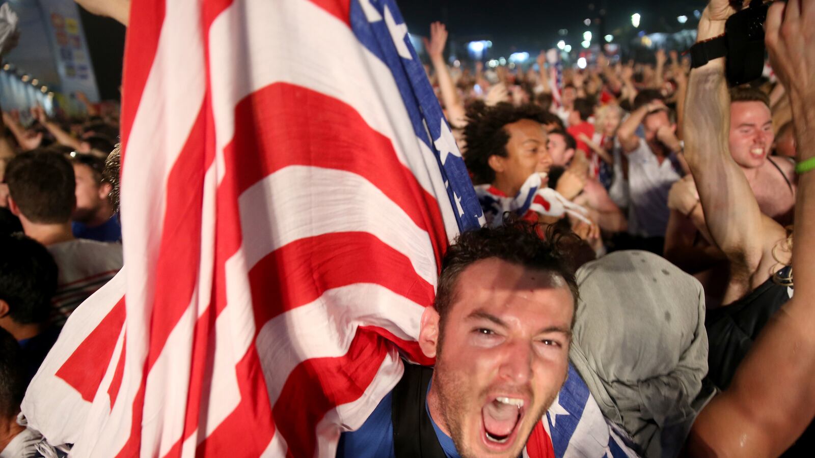 articles/2014/06/16/stars-and-stripes-2-black-stars-1-team-usa-takes-a-win-from-ghana/140616-tunku-usa-wc-tease_d16bfl