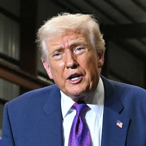 US President Donald Trump gestures at the end of his speech after touring the Coosa Steel Corporation factory in Rome, Georgia, February 19, 2026. (Photo by SAUL LOEB / AFP via Getty Images)