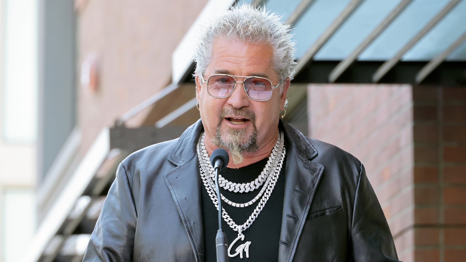Guy Fieri speaks onstage at the Hollywood Walk of Fame Star Ceremony honoring Sammy Hagar on April 30, 2024.