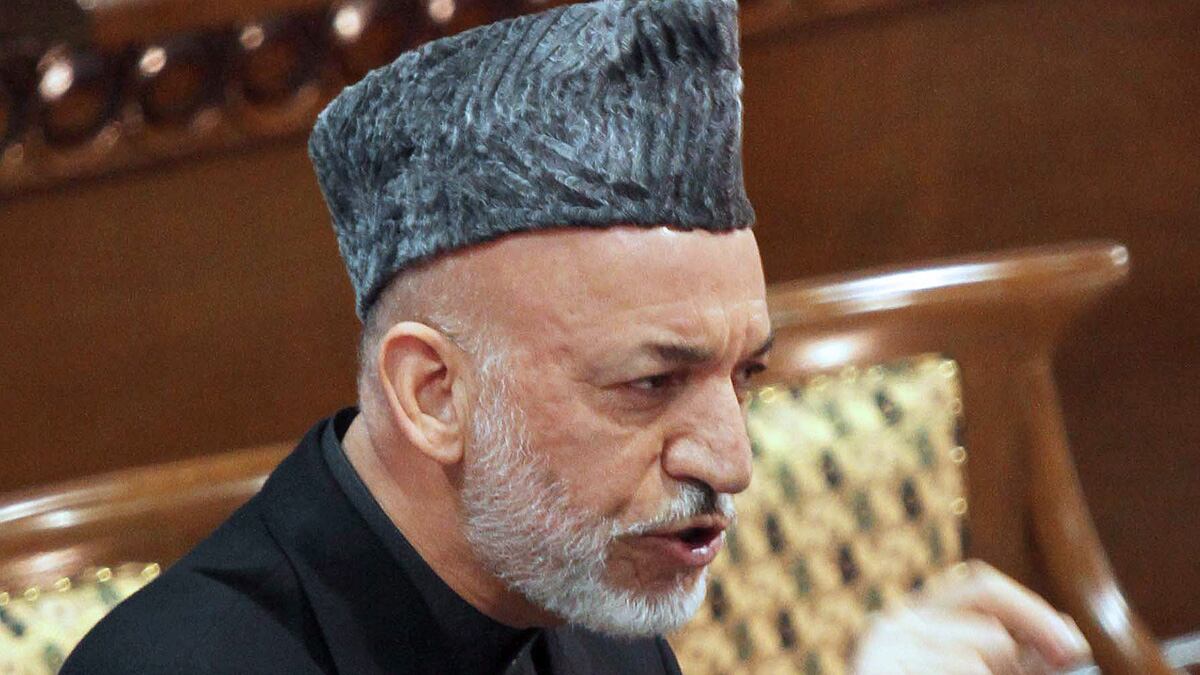 cheats/2012/03/11/karzai-can-t-forgive-u-s-killing/karzai-condemns-taliban-abuse-tape-box_holrgh