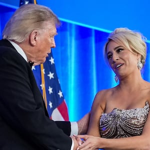 WASHINGTON, DC - JULY 24: U.S. President Donald Trump greets White House Correspondents Association President Jacqui Heinrich during the re-scheduled White House Correspondents Dinner in the Presidential Ballroom at the Waldorf Astoria on July 24, 2026 in Washington, DC. The annual gala hosted by the White House Correspondents Association was re-scheduled to tonight after the original event in April was cut short when an armed man, later identified as Cole Tomas Allen, attempted to get past a Secret Service checkpoint. (Photo by Eric Lee/Getty Images)