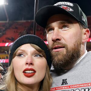 Taylor Swift and Travis Kelce standing together on a football field after the 2025 AFC championship gam.e