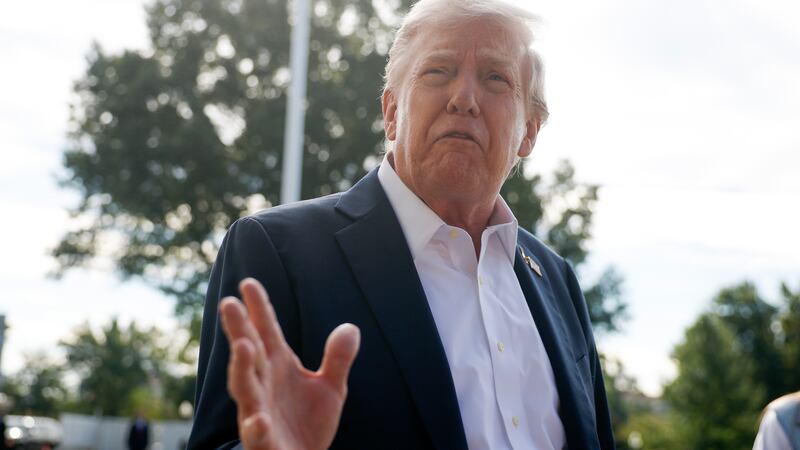 President Donald Trump speaks to members of the media as he departs the White House on September 26, 2025 in Washington, DC.