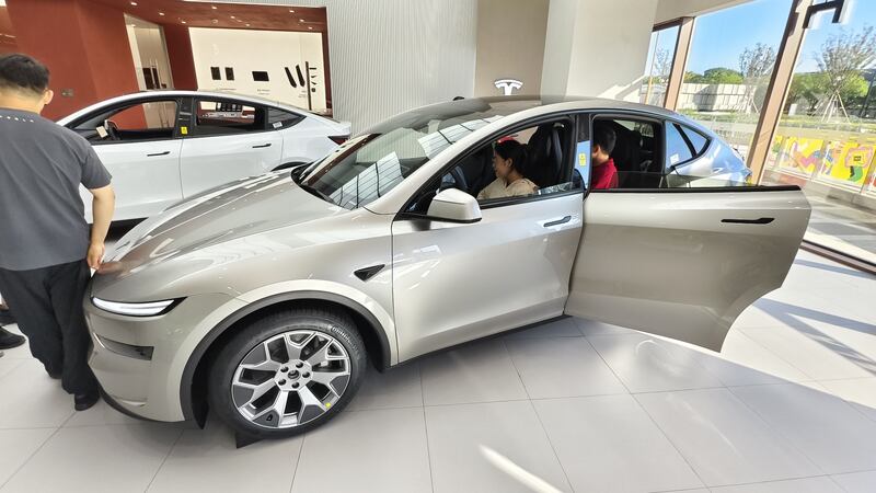 Customers experience the new six seater SUV Model Y L