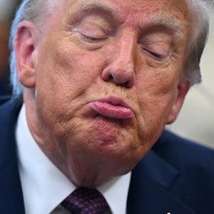 Donald Trump speaks signing an order sending National Guard troops to Memphis, in the Oval Office of the White House in Washington, DC, on September 15, 2025.