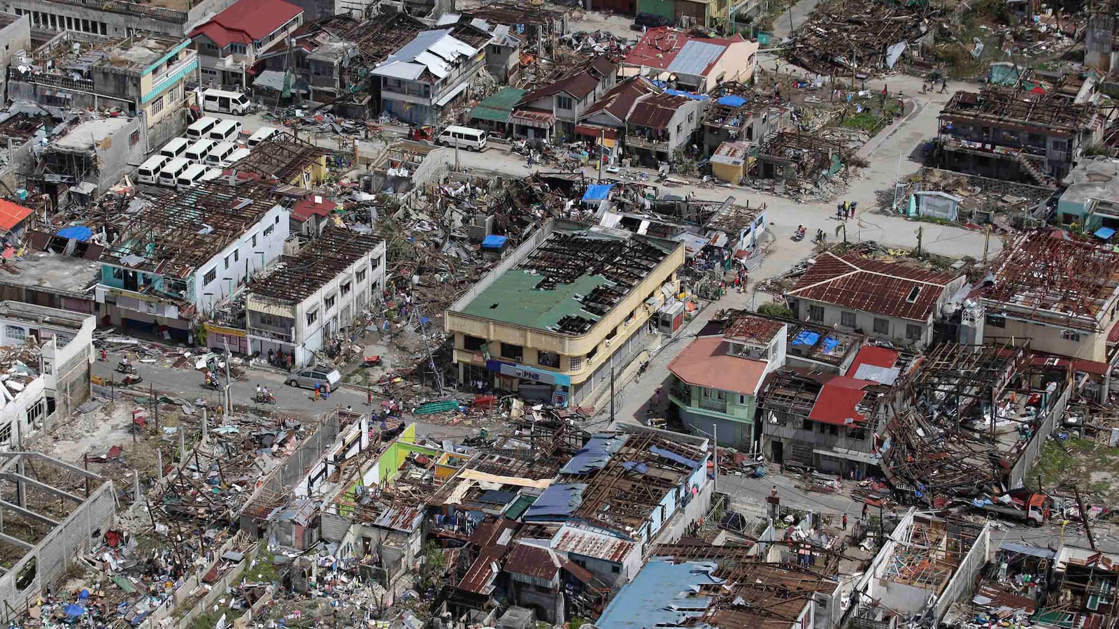 articles/2013/11/11/a-closer-look-at-the-aftermath-of-typhoon-haiyan/131112-philippines-zommer-tease_vxxwqy