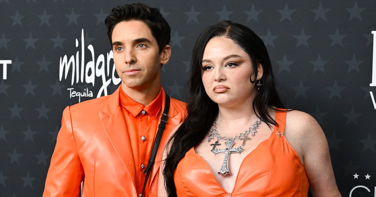 Paul W. Downs and Megan Stalter at the 31st Annual Critics Choice Awards held at the Barker Hangar on January 04, 2026 in Santa Monica, California.