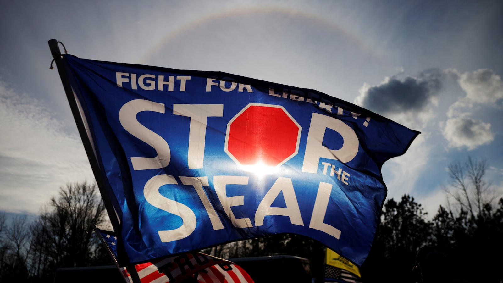 2021-01-04T221310Z_1606789092_RC2A1L9HG80O_RTRMADP_3_USA-ELECTION-GEORGIA-TRUMP_trkp7w