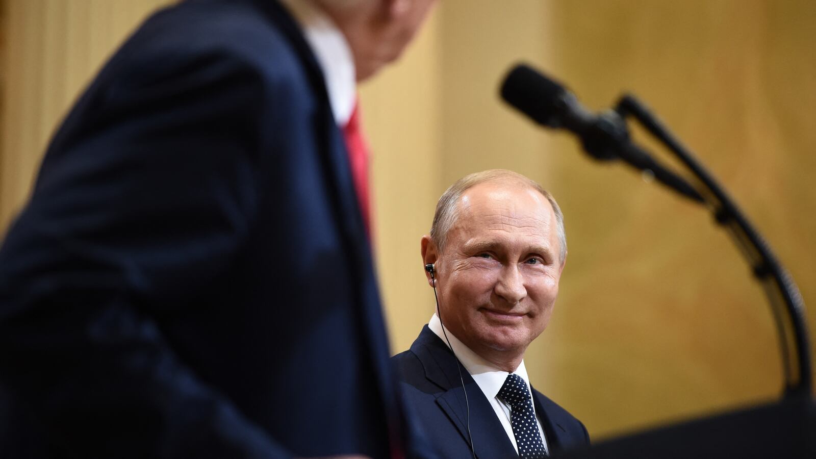 TOPSHOT - US President Donald Trump and Russia's President Vladimir Putin attend a joint press conference after a meeting at the Presidential Palace in Helsinki, on July 16, 2018. (Photo by Brendan SMIALOWSKI / AFP) (Photo by BRENDAN SMIALOWSKI/AFP via Getty Images)