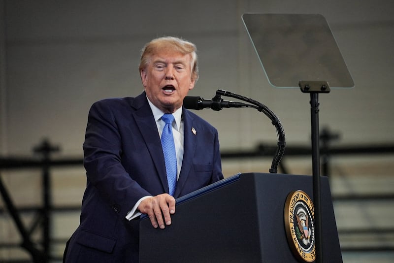 President Donald Trump delivers remarks at the David S. Mack Center for Training and Intelligence in Garden City, New York, on August 14, 2026.