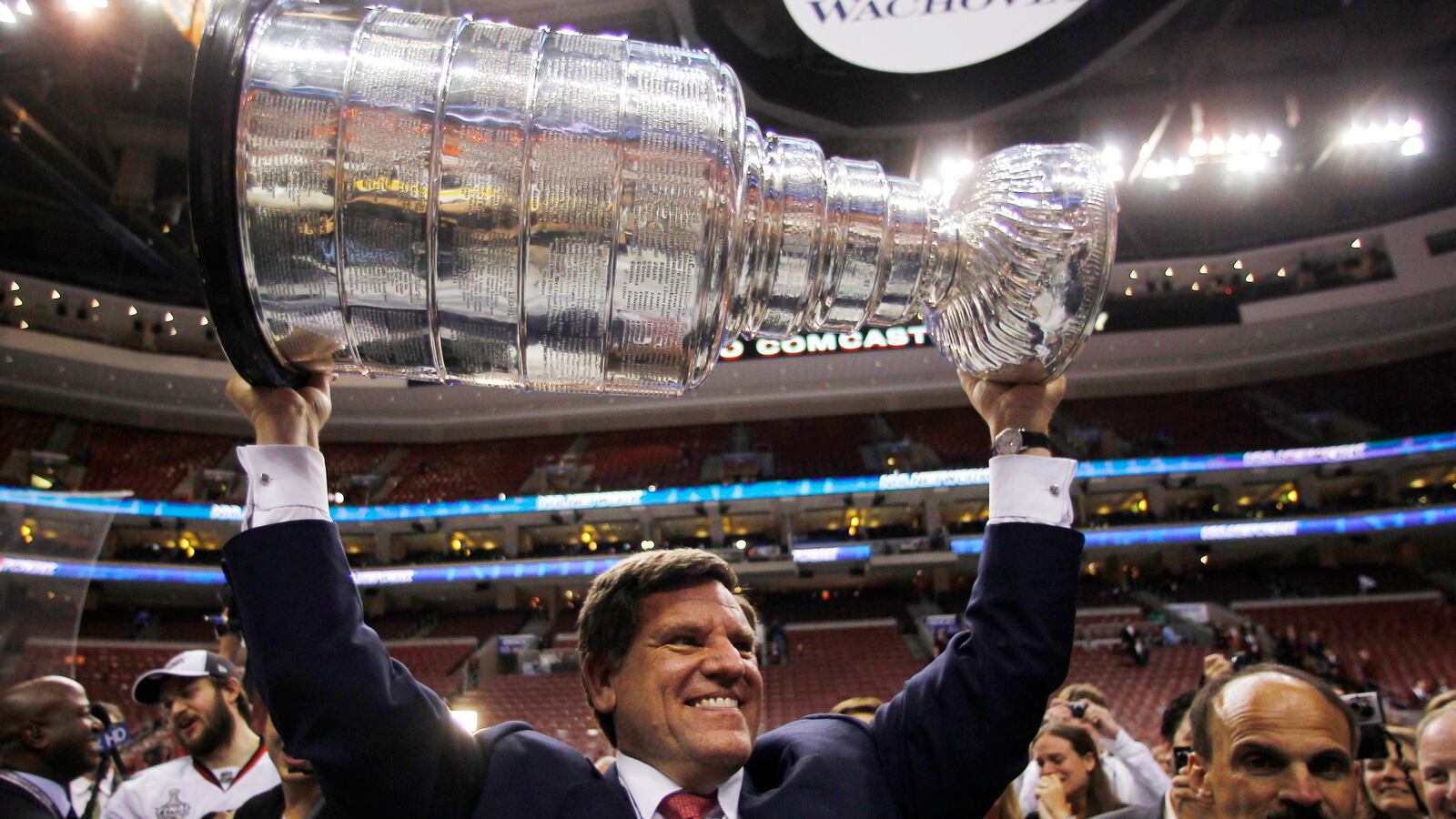 Chicago Blackhawks owner Rocky Wirtz hoists the Stanley Cup in Philadelphia, June 9, 2010.