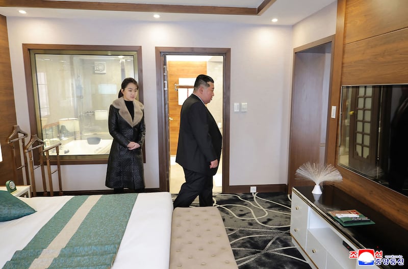This picture taken on December 20, 2025 and released by North Korea's official Korean Central News Agency (KCNA) via KNS on December 23, 2025 shows North Korean leader Kim Jong Un (L) and his daughter Ju Ae inspecting the Ikkal Hotel, which was recently completed in the Samjiyon tourist district of Ryanggang Province. (Photo by KCNA VIA KNS / AFP via Getty Images) / South Korea OUT / ---EDITORS NOTE--- RESTRICTED TO EDITORIAL USE - MANDATORY CREDIT "AFP PHOTO/KCNA VIA KNS" - NO MARKETING NO ADVERTISING CAMPAIGNS - DISTRIBUTED AS A SERVICE TO CLIENTS
THIS PICTURE WAS MADE AVAILABLE BY A THIRD PARTY. AFP CAN NOT INDEPENDENTLY VERIFY THE AUTHENTICITY, LOCATION, DATE AND CONTENT OF THIS IMAGE. /
