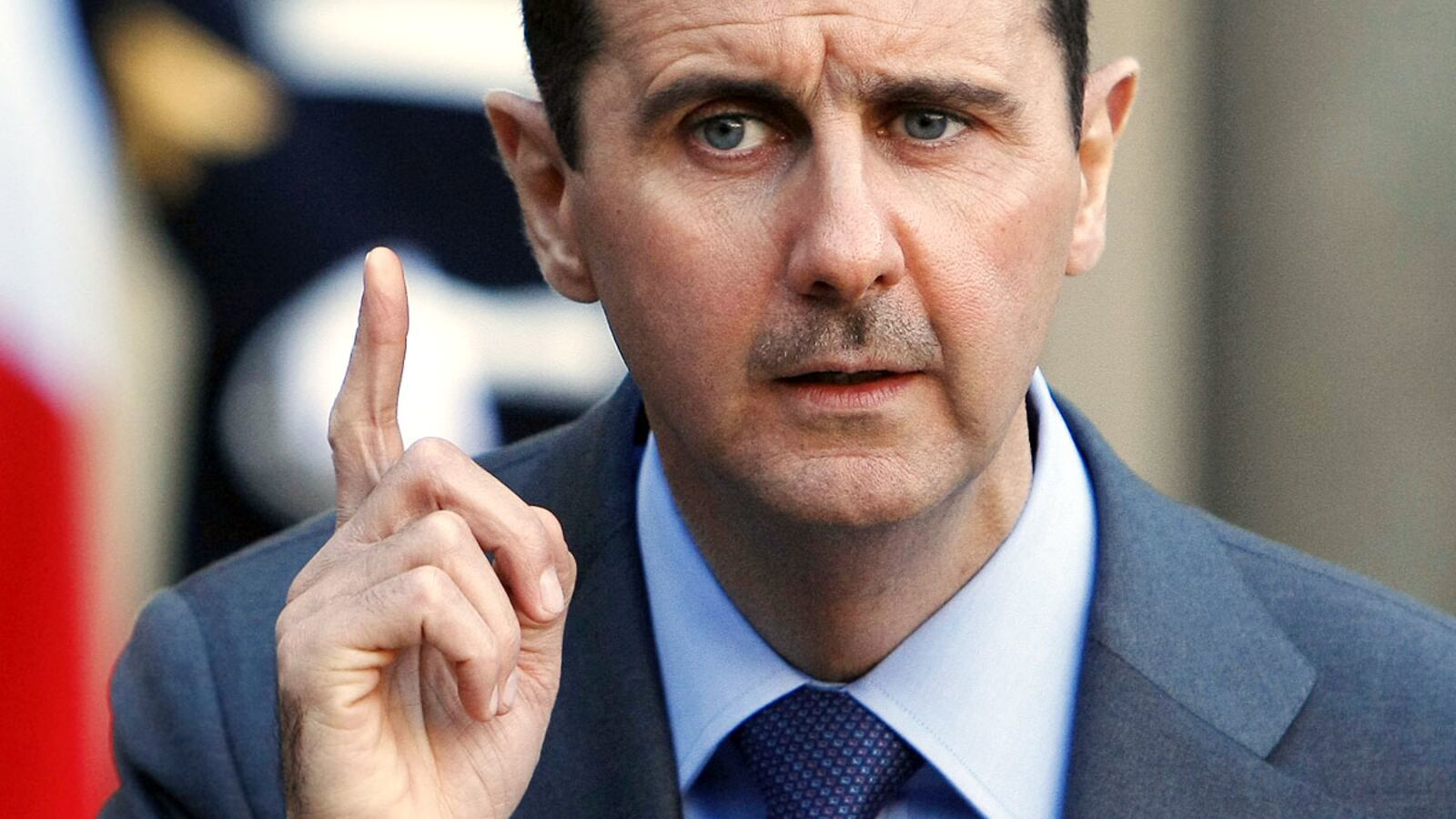 cheats/2012/12/05/report-assad-scopes-out-south-america/assad-finger-wag-cheat_w6iogq