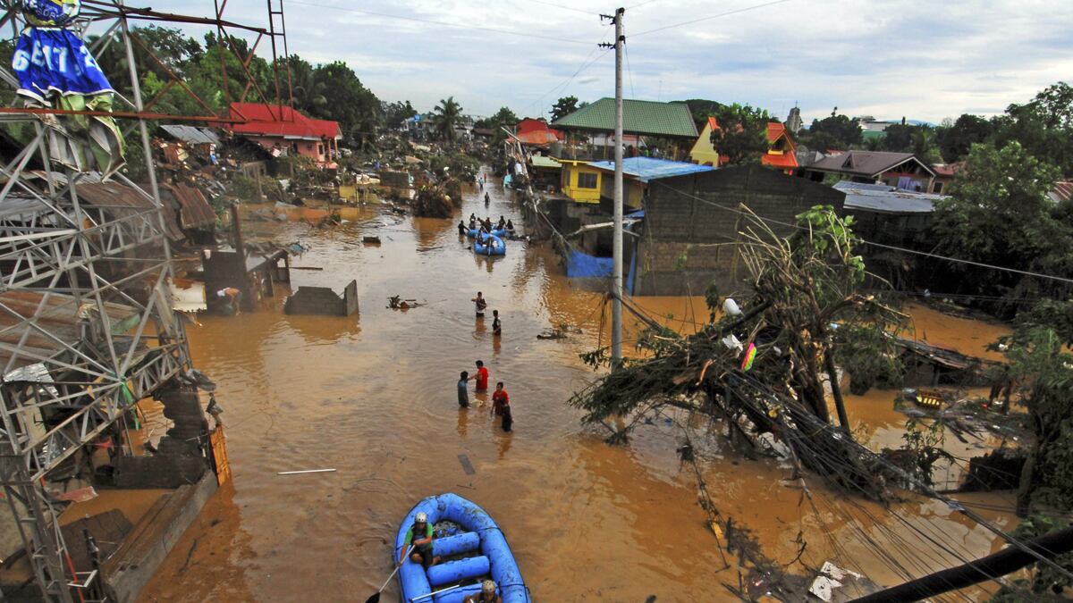 cheats/2011/12/17/typhoon-strikes-philippines/flash-floods-philippines-cheat_my9xq9