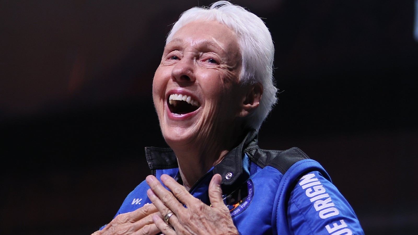 Wally Funk celebrating her land from space