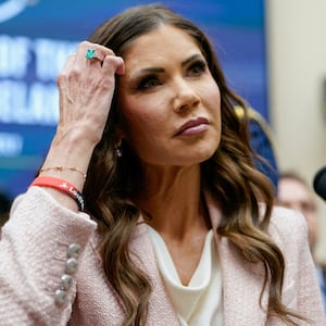 U.S. Homeland Security Secretary Kristi Noem wears a wristband in support of the non-profit organization Lost Voices of Fentanyl as she attends a House Judiciary Committee hearing on "Oversight of the Department of Homeland Security" to testify, on Capitol Hill in Washington, D.C., U.S., March 4, 2026.