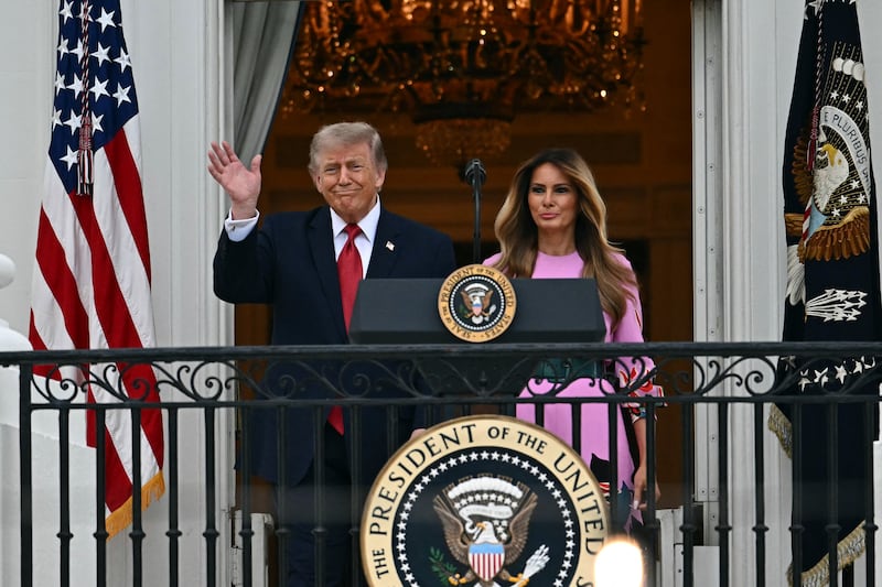 US President Donald Trump and First Lady Melania Trump greet attendees of the Congressional Picnic on the South Lawn of the White House in Washington, DC on May 19, 2026.