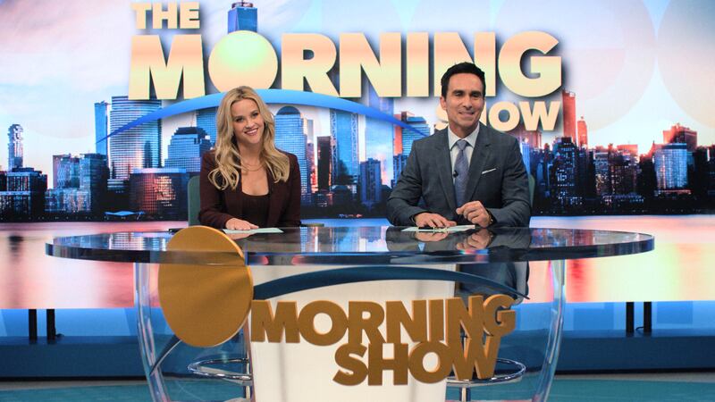 Reese Witherspoon and Nestor Carbonell in The Morning Show.