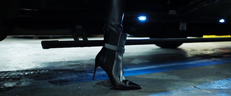 Melania's footwear is heavily featured throughout the trailer.
