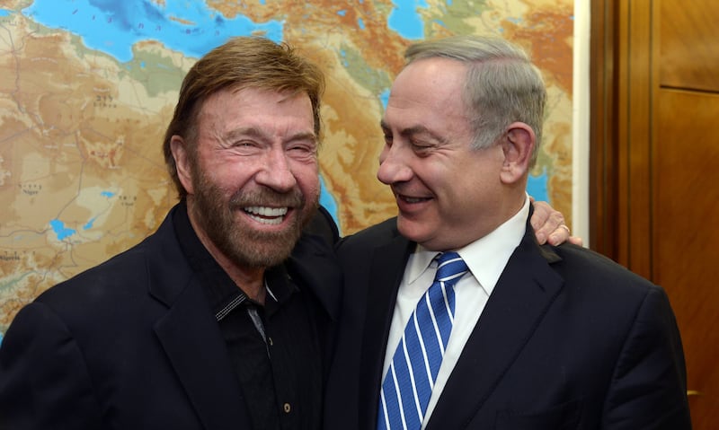 Israeli Prime Minister Benjamin Netanyahu meets with actor Chuck Norris on February 8, 2017, in Jerusalem, Israel.