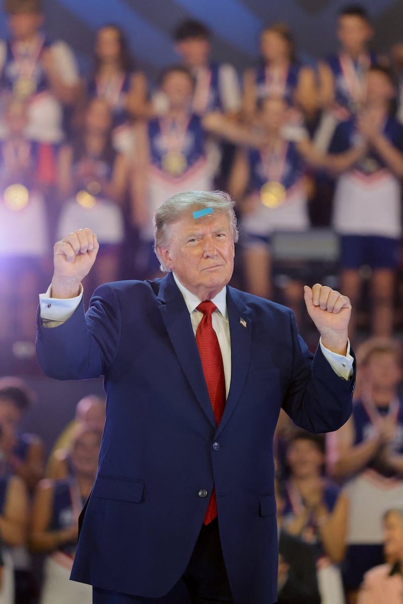 U.S. President Donald Trump dances during the 2026 Patriot Games final at SPIRE Academy in Geneva, Ohio, U.S., August 11, 2026. REUTERS/Kylie Cooper