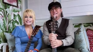 The last time Owens saw Parton, it was to give her a Martin guitar.