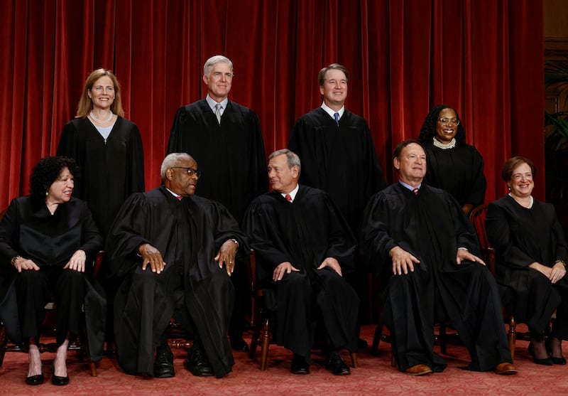 U.S. Supreme Court justices pose for their group portrait at the Supreme Court in Washington, U.S., October 7, 2022. Seated (L-R): Justices Sonia Sotomayor, Clarence Thomas, Chief Justice John G. Roberts, Jr., Samuel A. Alito, Jr. and Elena Kagan. Standing (L-R): Justices Amy Coney Barrett, Neil M. Gorsuch, Brett M. Kavanaugh and Ketanji Brown Jackson. REUTERS/Evelyn Hockstein