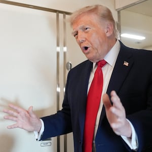 U.S. President Donald Trump speaks to members of the media on board Air Force One while flying from Joint Base Andrews to Chippewa Valley Regional Airport in Eau Claire, Wisconsin, U.S., June, 5, 2026. REUTERS/Nathan Howard