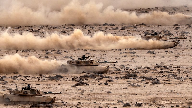 Abrams tanks roll in formation during in the annual "African Lion" joint military exercise between US and Moroccan forces in the Tan-Tan region in southwestern Morocco on May 31, 2024.