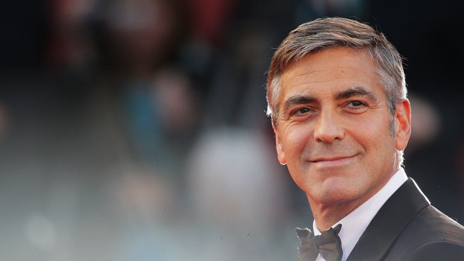 articles/2014/09/28/george-clooney-the-consummate-charmer/140209-teeman-clooney-tease_mttxxq