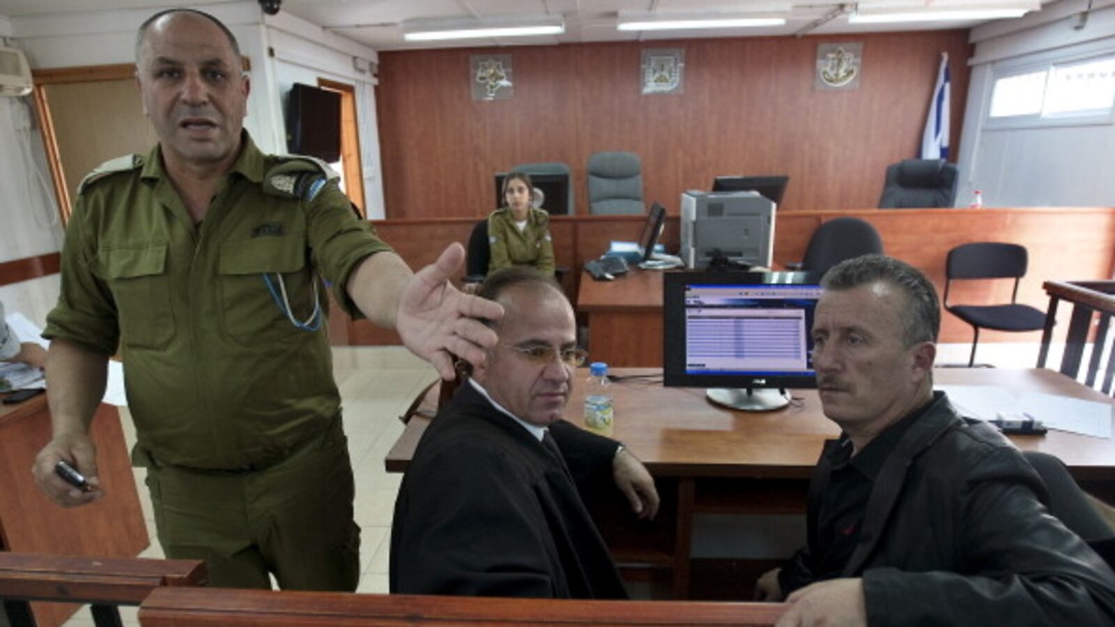 articles/2012/10/10/do-you-understand-the-charges-against-you/tamini-military-court-openz_ncbzln
