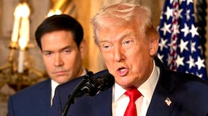 US Secretary of State Marco Rubio looks on as US President Donald Trump speaks