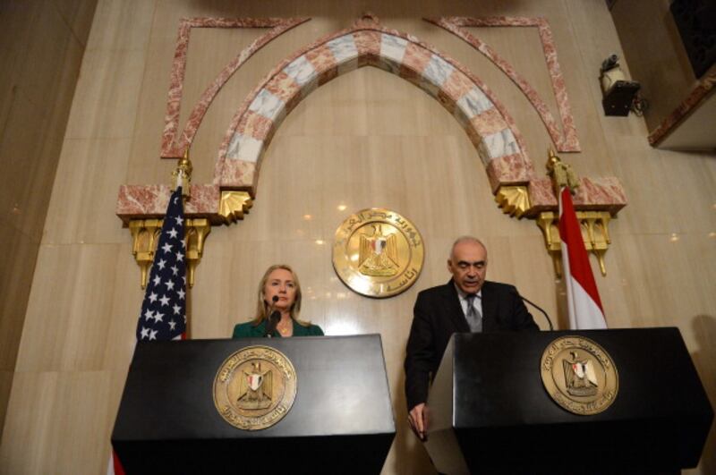 articles/2012/11/21/america-and-this-ceasefire/clinton-egypt-openz_m5msyz