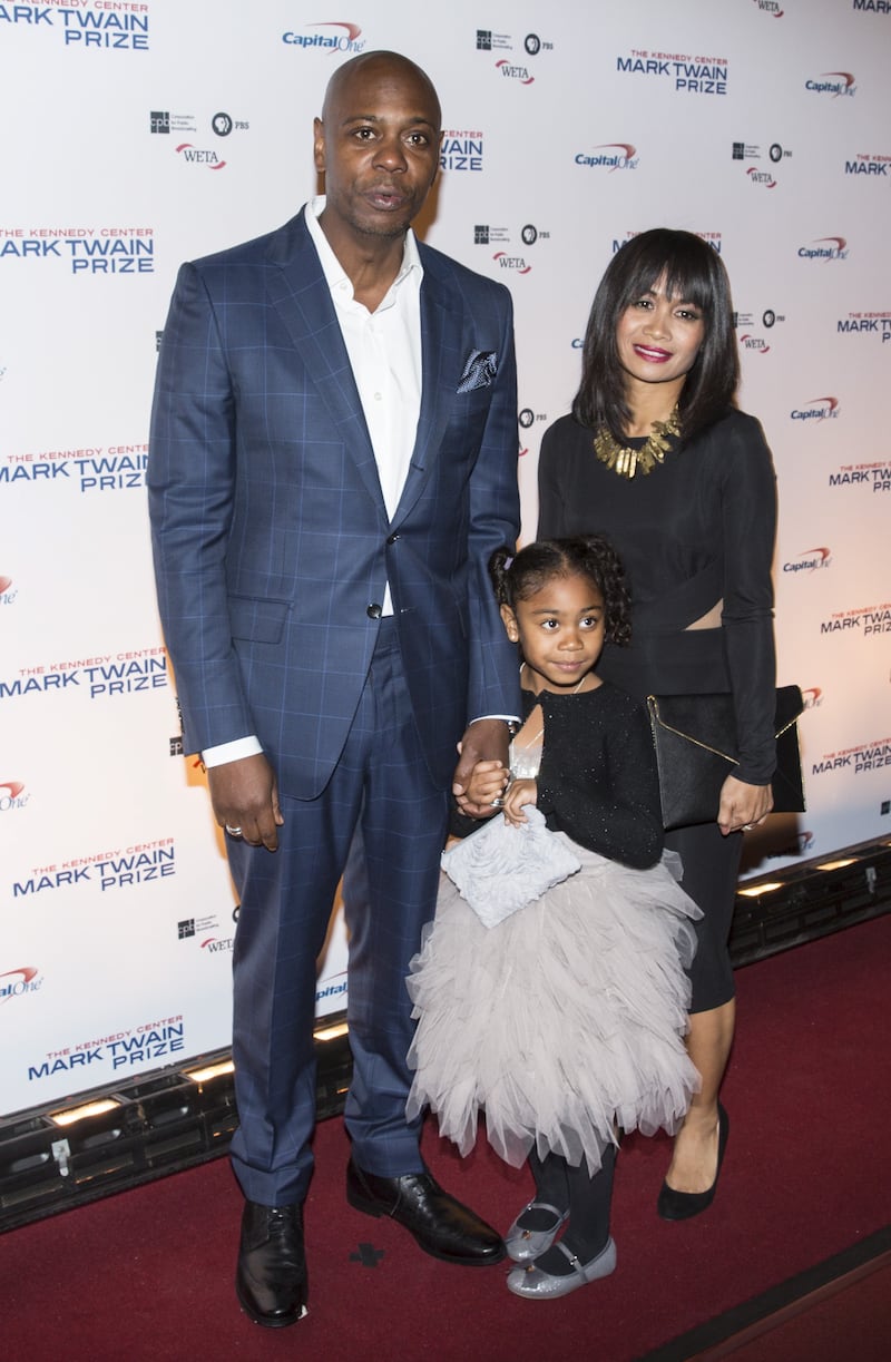 Comedian Dave Chappelle arrives with his wife Elaine and daughter Sonal for the Mark Twain prize for Humor honoring Eddie Murphy