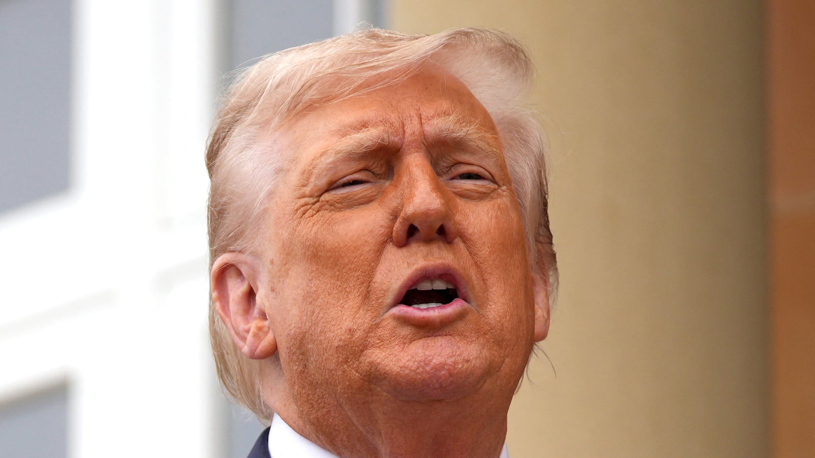 President Donald Trump speaks with the media before a bilateral meeting with Britain's Prime Minister Keir Starmer at the Trump Turnberry Golf Courses, in Turnberry south west Scotland on July 28, 2025.