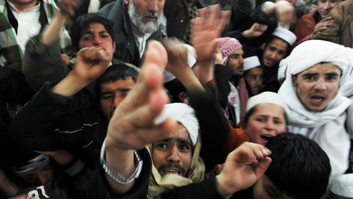 articles/2012/02/26/santorum-rips-obama-weakness-makes-political-hay-of-quran-burning/quran-burning-protest_lq1rgn