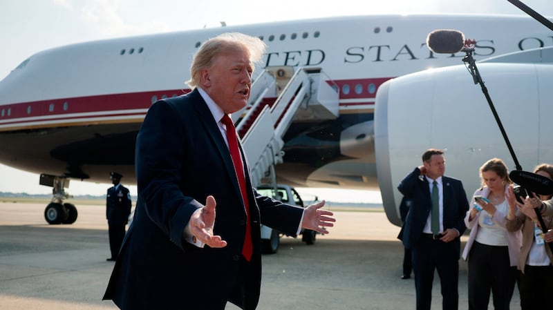 U.S. President Donald Trump gestures as he speaks with reporters before boarding the new Air Force One, a plane gifted by the Qatari government, at Joint Base Andrews, Maryland, U.S., July 1, 2026. REUTERS/Evan Vucci