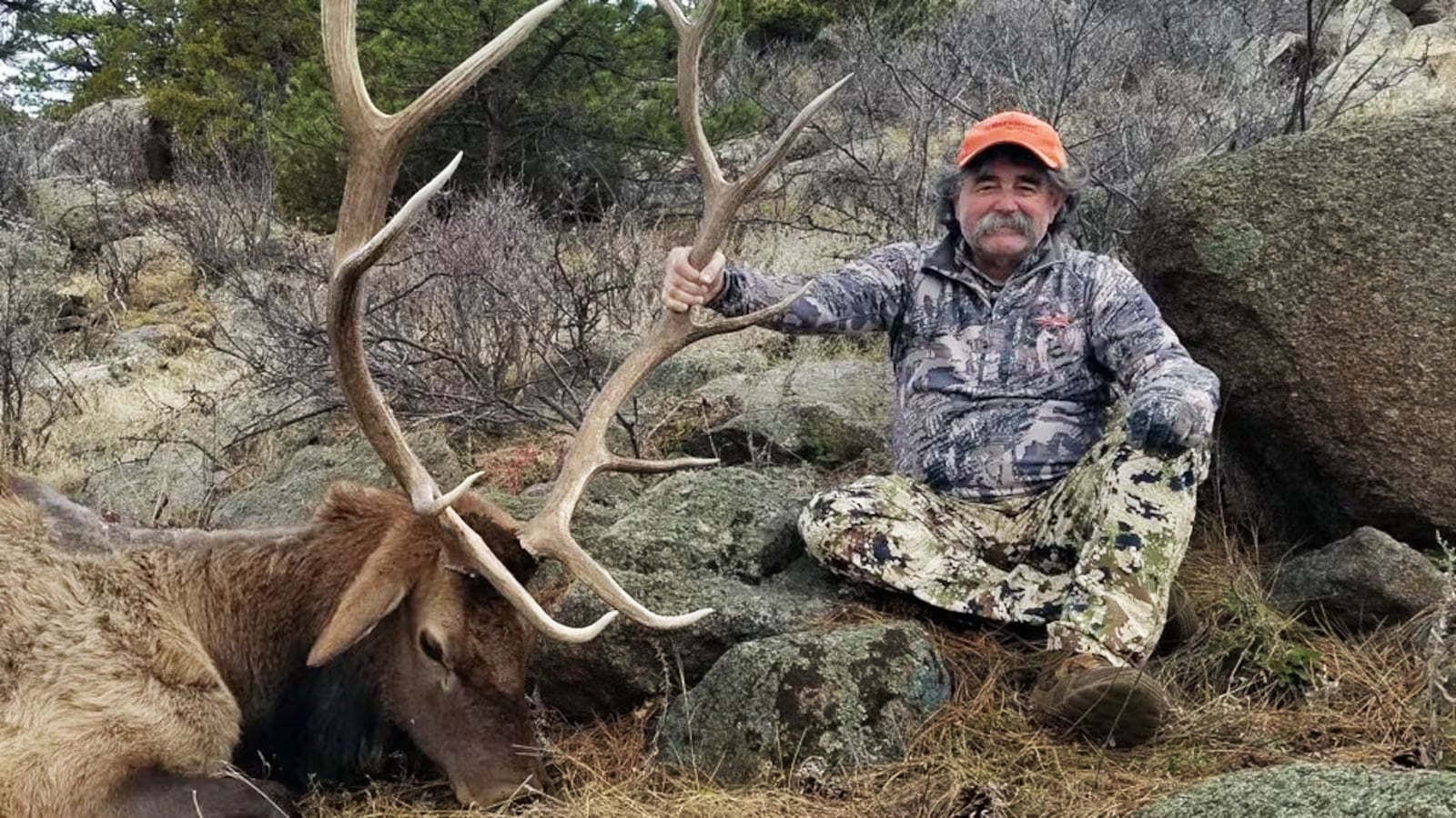 Ernie Dosio with a dead animal he killed and hunted