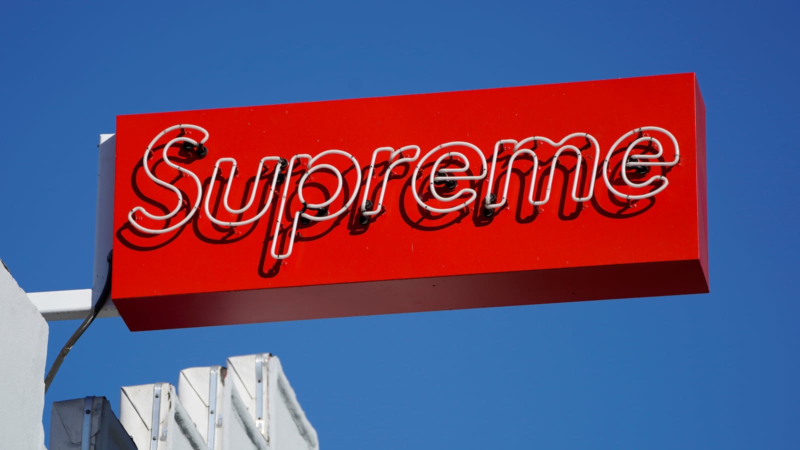 A Supreme clothing store sign