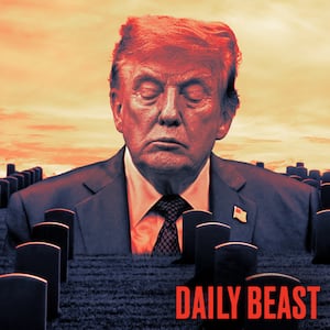 Donald Trump amid military headstones.