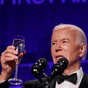 President Joe Biden raises a toast as he speaks during the White House Correspondents' Dinner in Washington, D.C. on April 27, 2024.