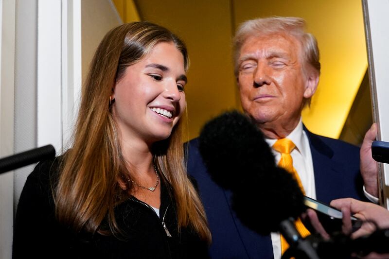 U.S. President Donald Trump's granddaughter Kai Madison Trump speaks to the media on board Air Force One on the way to West Palm Beach, Florida, U.S., April 13, 2025.
