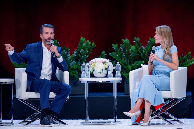 Donald Trump Jr. and right-wing pundit Megyn Kelly speak onstage in Sugar Land, Texas, on Thursday evening.